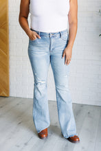 Load image into Gallery viewer, Caroline Mid Rise Control Top Distressed Flare Jeans
