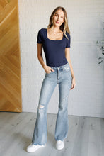 Load image into Gallery viewer, Caroline Mid Rise Control Top Distressed Flare Jeans
